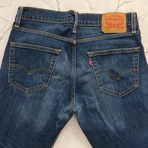 Levi’s Slim 511 size 32x30, dark blue wash jeans.
